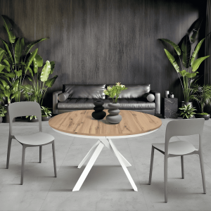 Tavolo rotondo allungabile moderno con base in metallo e piano rovere.